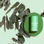 WooHoo Wild deodorant stick styled among eucalyptus branches