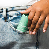 WooHoo Wild deodorant stick tucked into a jeans pocket