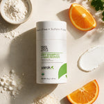 Yarok Feed Your Style Dry Shampoo flat lay with orange and powder