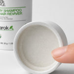 Close-up of Yarok Feed Your Style Dry Shampoo powder texture