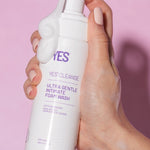 Hand holding YES Cleanse Fragrance-Free Intimate Wash