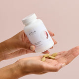 Hands holding Zilch PMS + Stress Formula and tablets – Zilch PMS + Stress Formula 120 Tablets